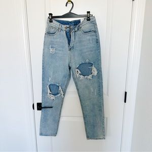 Distressed Blue Denim Jeans
